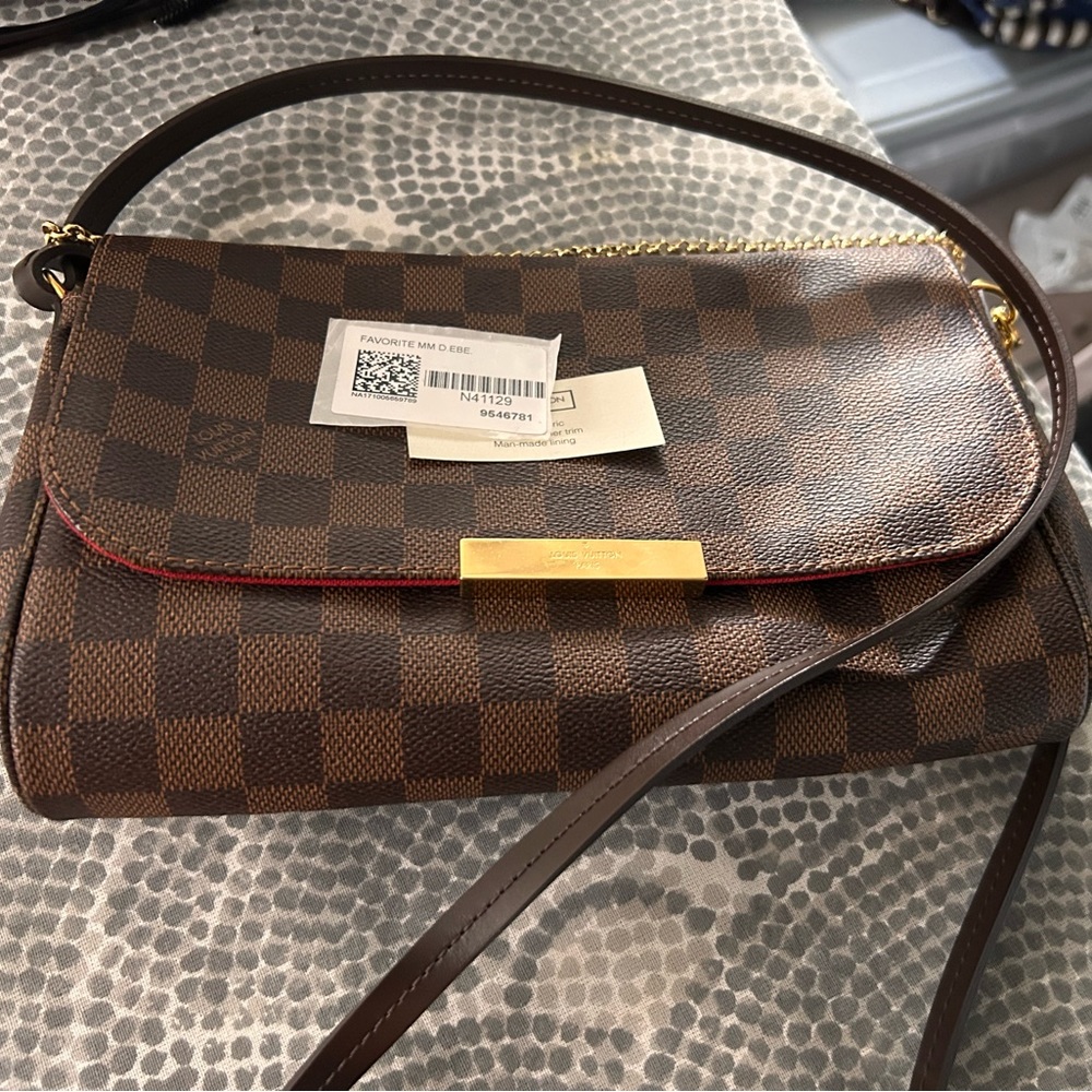 Louis Vuitton wallet on a chain